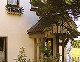 Porch and hanging baskets